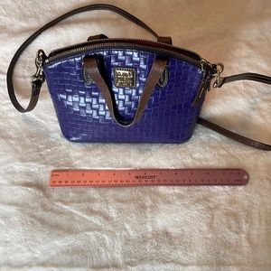 Dooney and Bourke domed small crossbody purple Ruby Satchel. Basketweave design
